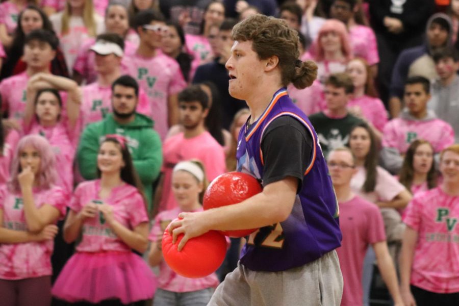 Senior James Allmers prepares to throw a ball during the dodgeball game.