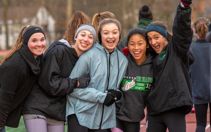 Sophomores+Shannon+Connelly%2C+Julianna+Mullaney%2C+Emma+Epiphaniou%2C+Ai+Lin+Doody+and+Mia+Puccio+pose+for+a+picture+at+a+track+practice+during+the+teams+first+week+of+training.
