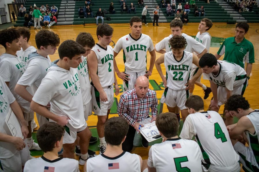 Boys+basketball+coach+Al+Coleman+talks+to+his+players+during+a+timeout+