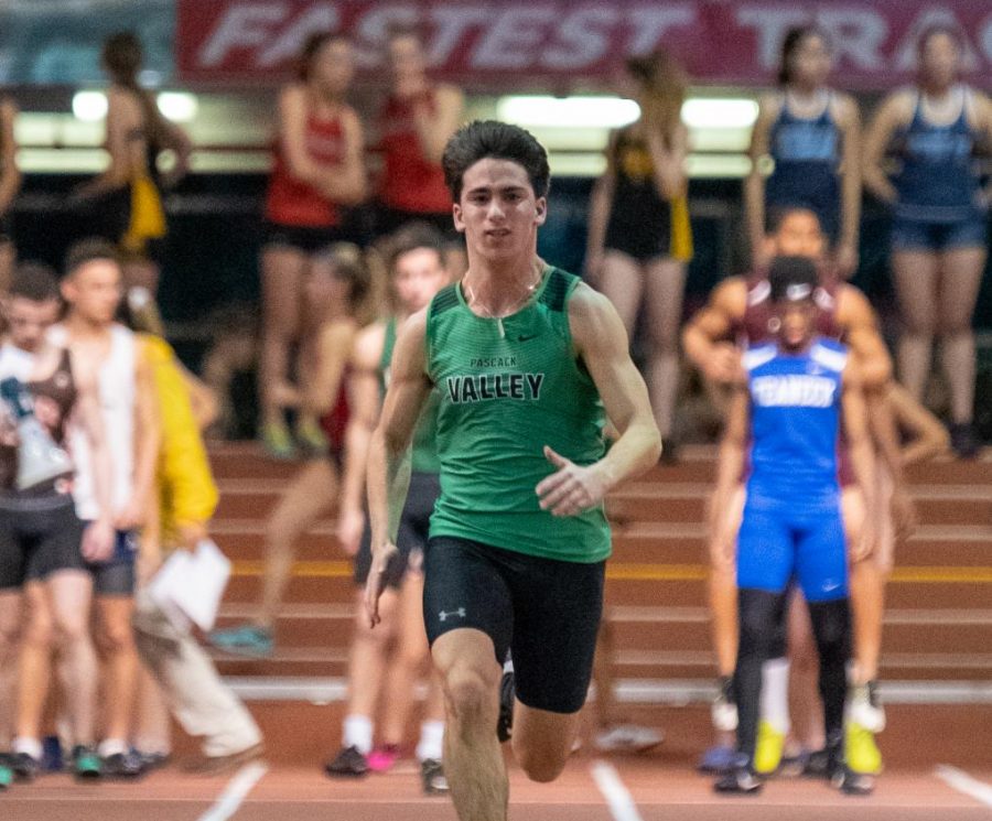 Oren Roznitsky runs at the Armory Track in NYC.  PVs Sprint Medley Relay qualified for nationals before the event was cancelled due to coronavirus concerns.