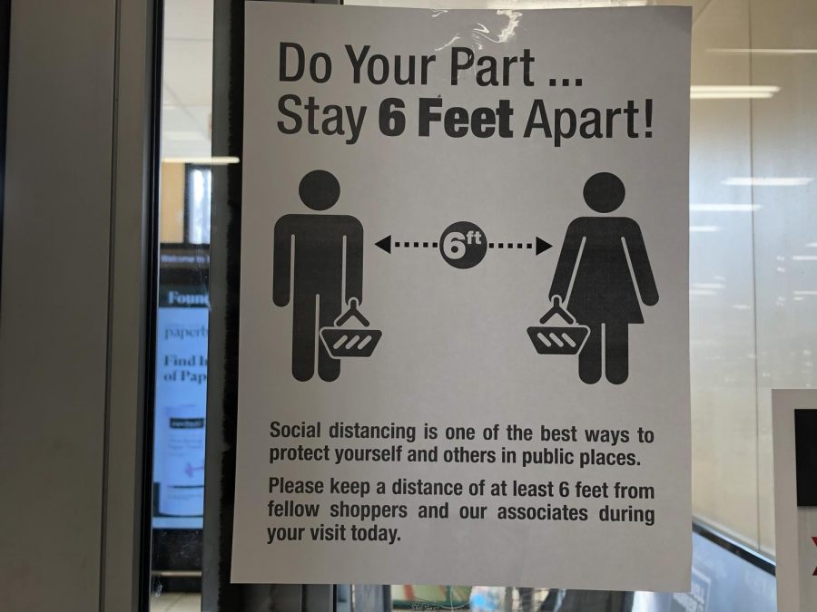 Grocery stores, including the ShopRite in Hillsdale, have hung up posters and signs to promote social distancing. However, the sign did not stop customers from standing close together by the checkout aisles.