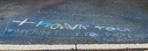 Thank you healthcare heroes is written on the driveway of a house in River Vale. Hillsdale and River Vale residents have shown their support through chalk drawings and messages. 