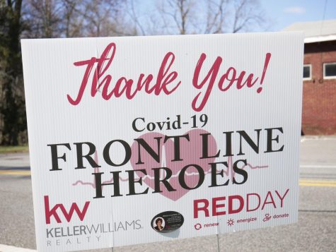 A lawn sign thanks medical professionals and personnel on the frontlines of the pandemic. Many can be found throughout the surrounding towns.