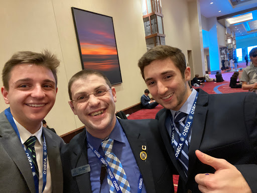 PV seniors Anakin Rybacki and Thomas DeWitt with NJ DECA State Advisor Jeffrey Victor at one of last years in-person DECA events. This year, students could not attend in-person events due to COVID-19, and all events were all held virtually.