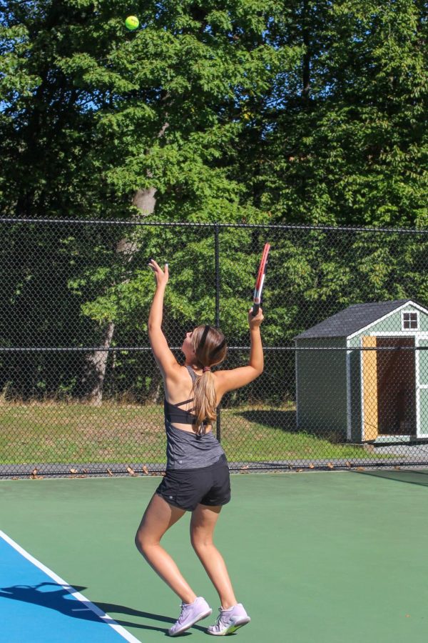 Jordyn Ban practices her serve.  She will be a captain and key contributor for the Pascack Valley Girls Tennis team this season.