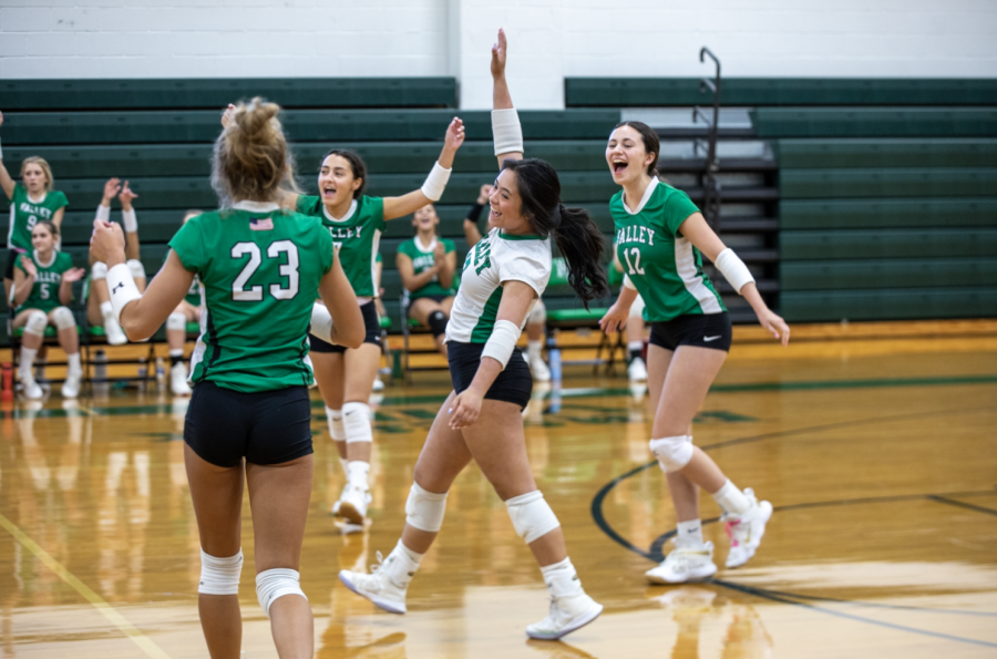 Sabrina Arcilla and her team celebrate after winning a key point. The team looks to have yet another successful season.