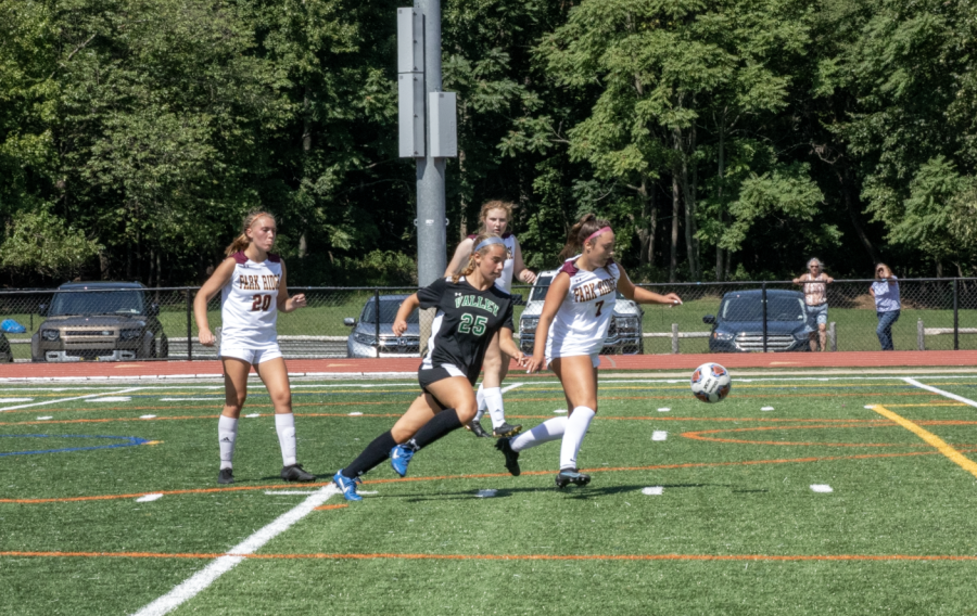 Julia Conjour tries to get around the Park Ridge defender in their game on Saturday. They defeated Park Ridge 4-1 over the weekend.