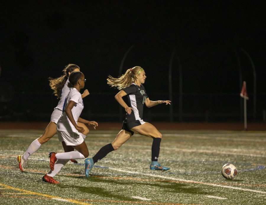 Amanda Polyniak dribbles past two defenders in one of Valleys games last season. The girls look to go even further in the state tournament this season, with senior leadership and strong newcomers.