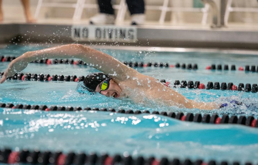Senior Captain Zachary Berde swims freestyle in an attempt to win his race. Check out both the boys and girls swim teams at their first meet on Thursday Dec. 8 at Bethany Community. 