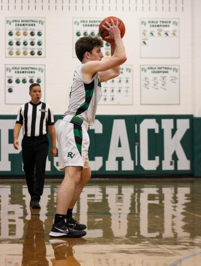 Michael Criscuolo looks to make a pass in the boys basketball teams game against Tenafly. He is this years male athlete of the year.
