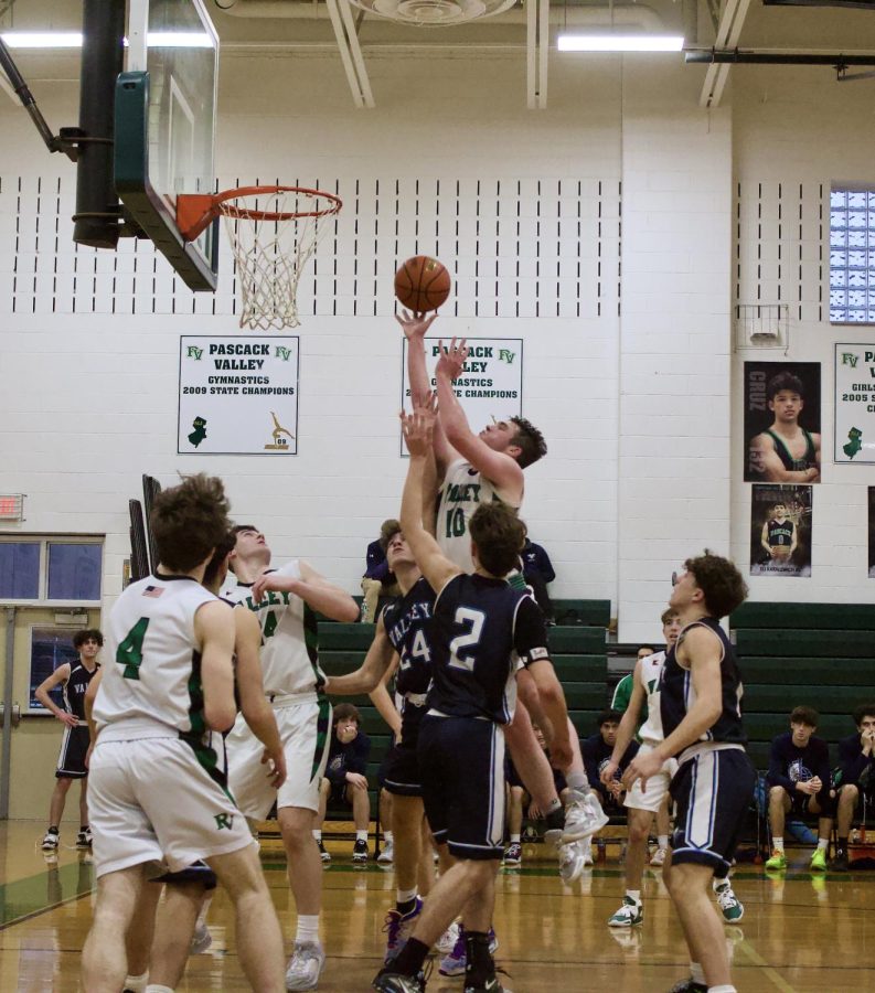Jimmy Shea goes up strong in the boys basketball teams game against Wayne Valley.