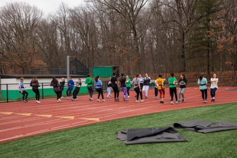 The track team warms up at practice. Coach Anthony Judilla and the team look to build off of their strong distance runners.