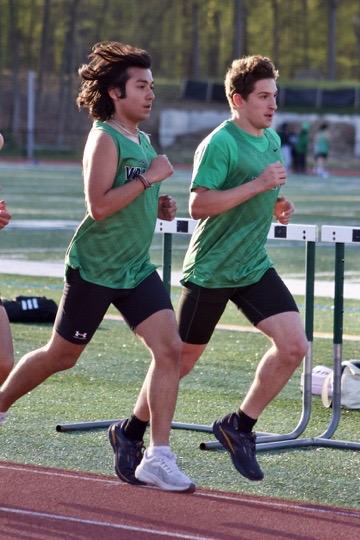 Michael Pizzella and Jay Ramirez run in a meet. They, and the cross country team, are this years male team of the year.