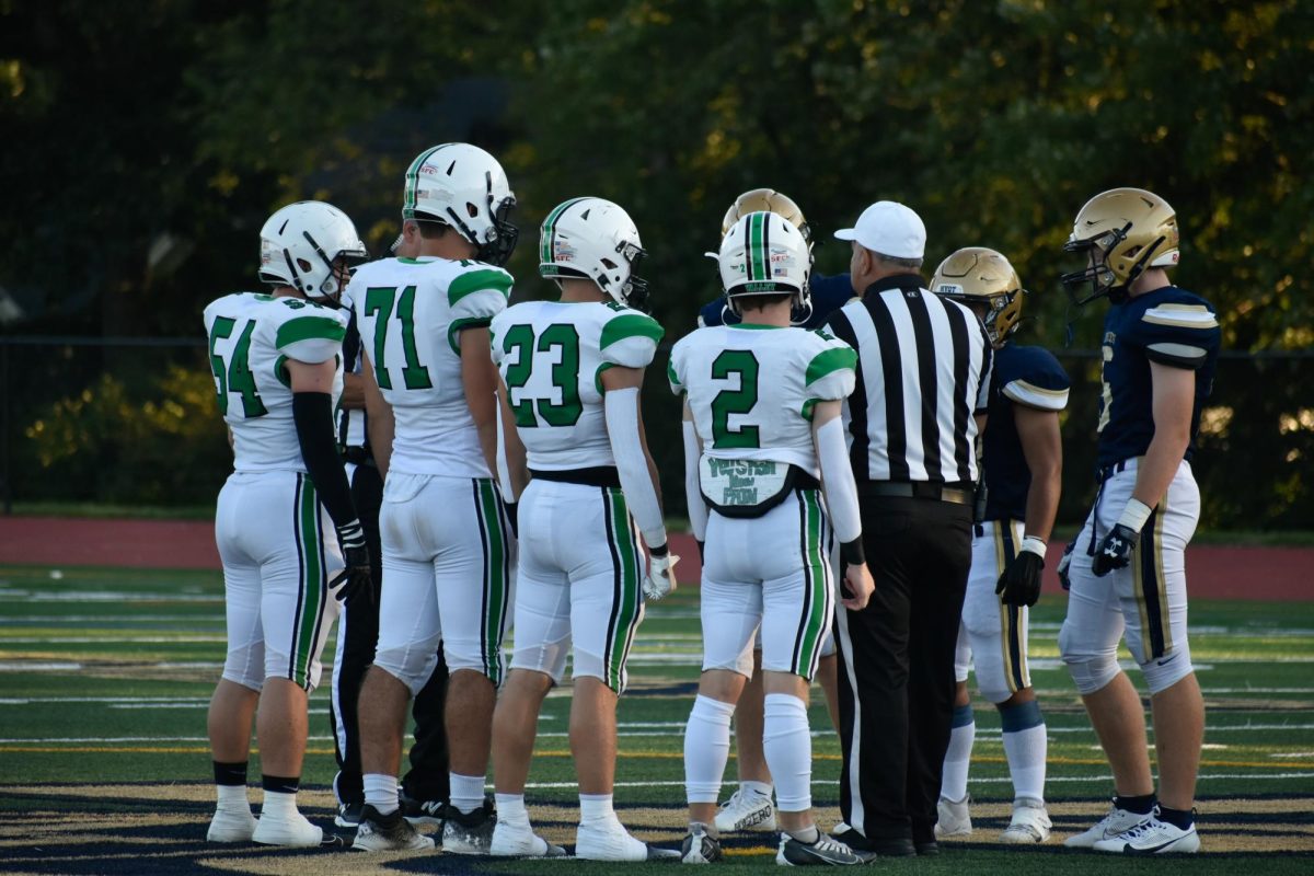 The+Pascack+Valley+Football+team+captains+stand+at+the+center+of+the+field.+The+football+team+won+47-14+this+week+against+Demarest.+Check+out+the+rest+of+the+fall+sports+highlights+below.