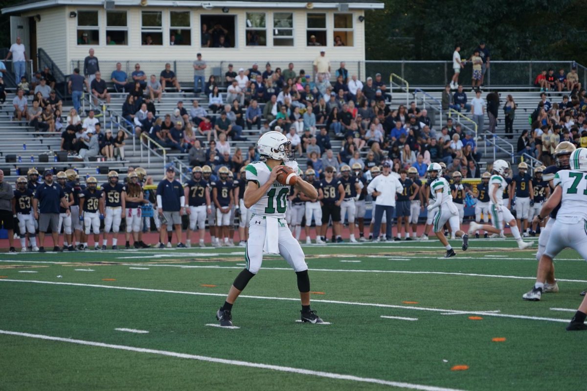 Adam Shaw looks to make a pass in the football teams game against Old Tappan. They earned the No.3 seed in the North 1, Group 3 state sectional tournament. Check out the football, boys soccer and girls soccer tournament previews below.