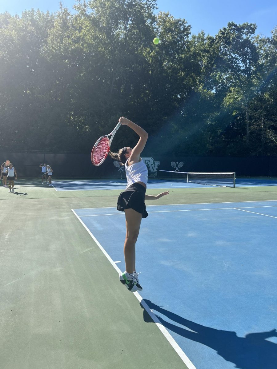 Captain Jordyn Ban warms up her serve.