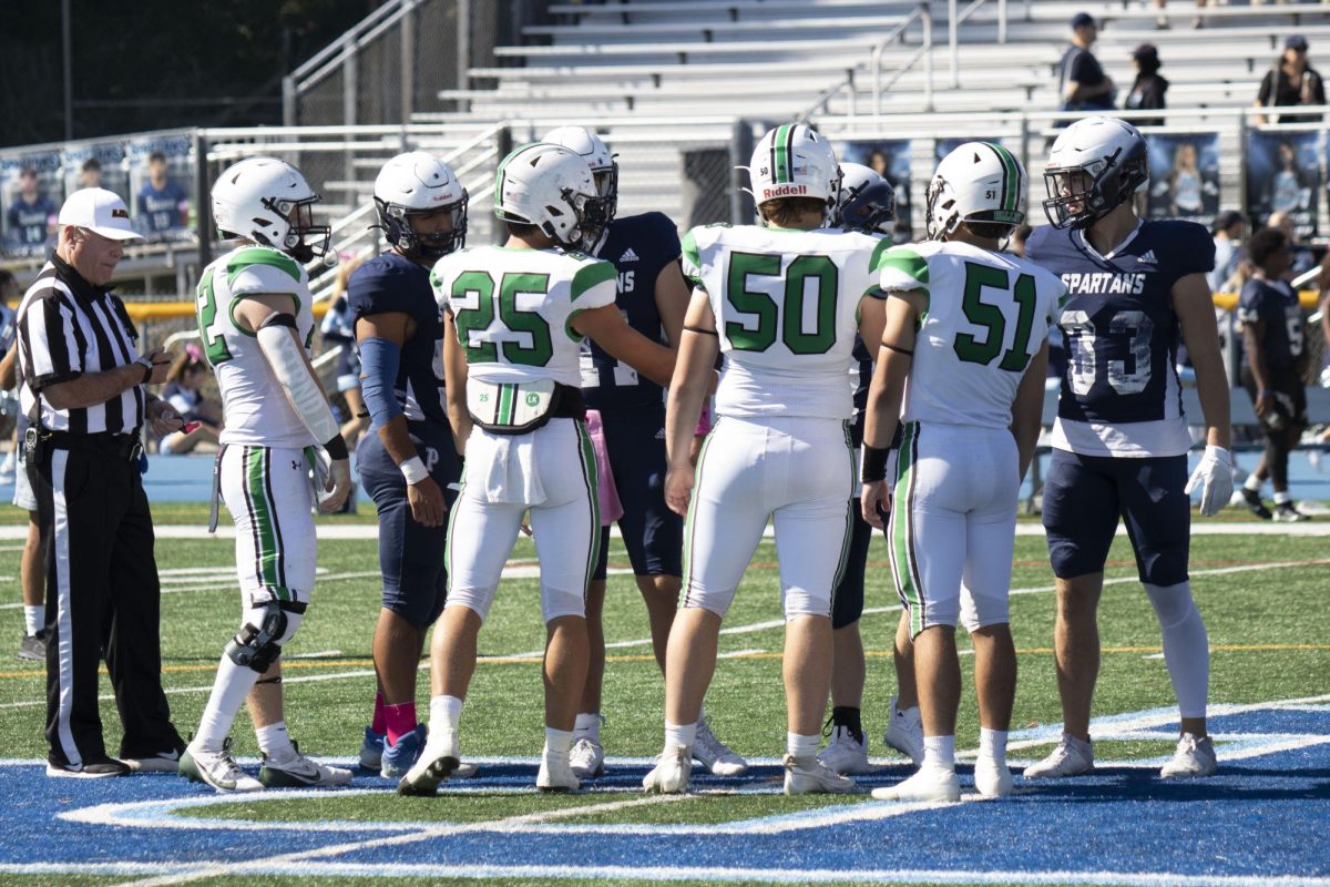 Captains for Valley and Paramus meet for coin toss.