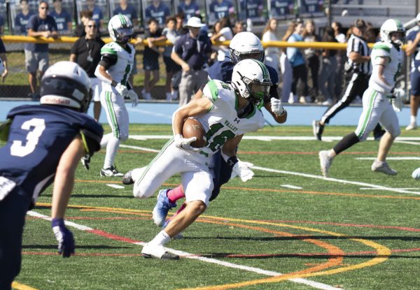 Marc Dellaquila (Sr.) runs back his interception against Paramus on Oct. 5, 2024