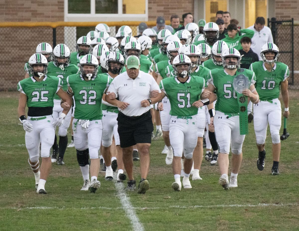 The Pascack Valley Football Team walked onto the field before Friday night's win over West Milford.