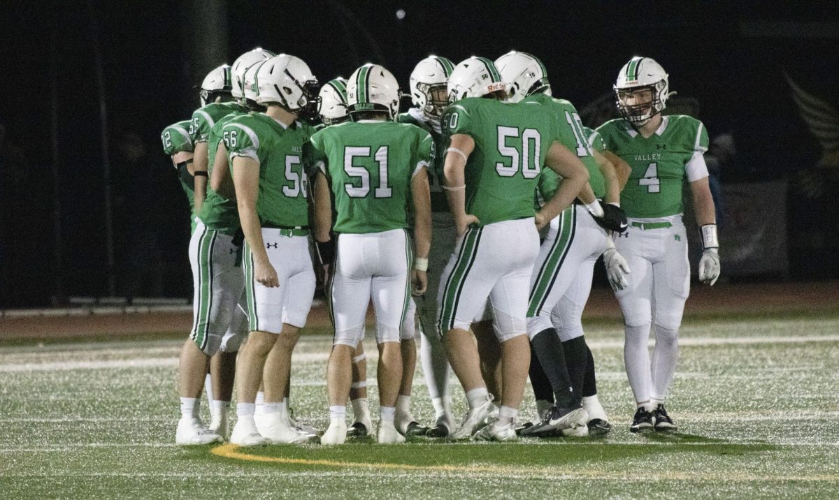 Pascack Valley Football Team huddles up 