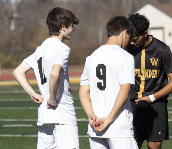 Captains Robbie Wasserman (Sr.) and Steven Gifford (Sr.) lined up for the coin toss in Friday's game against West Milford.