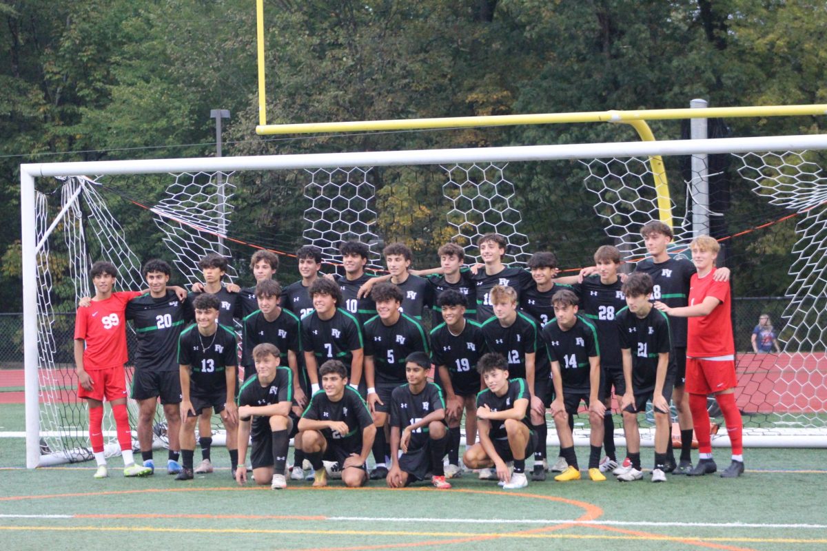Pascack Valley Boys Soccer Team takes a picture after the Senior Night ceremony