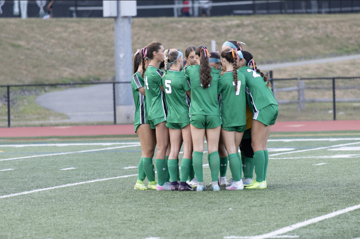 PV Girls Soccer huddles up before their 2-1 win against Parsippany on Wednesday