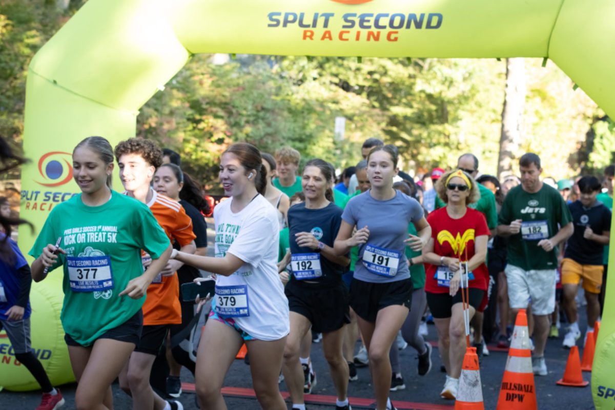 Participants finishing the 5K