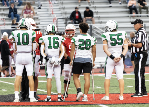 PV football senior captains Adam Shaw, Marc Dellaquila, Kai Smith, and Nicky Lamparillo during the coin toss against Westwood on Sep. 5 