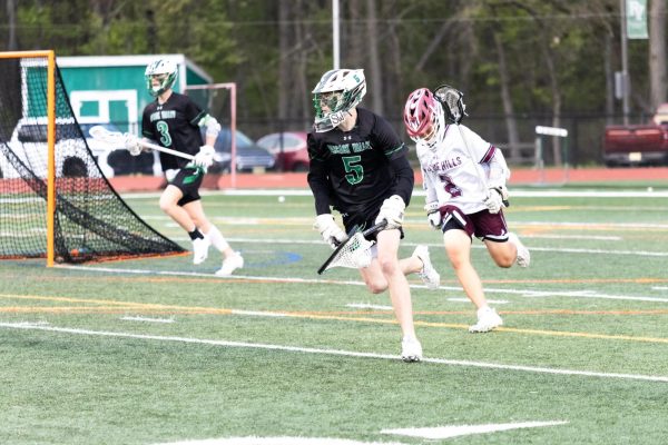Brendan Haller (Jr.) runs with the ball in PV Lacrosse' 19-7 win against Wayne Hills 